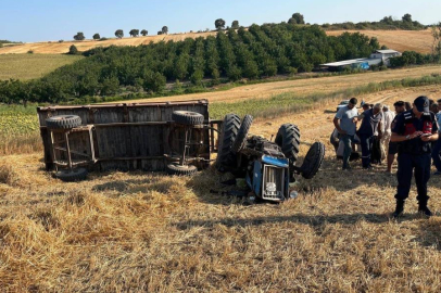 DEVRİLEN TRAKTÖRÜN ALTINDA CAN VERDİ