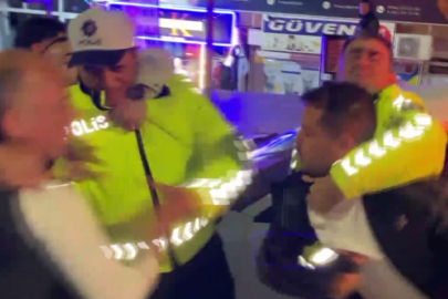 ALKOLLÜ SÜRÜCÜ BAŞKANI ARIYORUM DEDİ: POLİSE YUMRUK ATTI