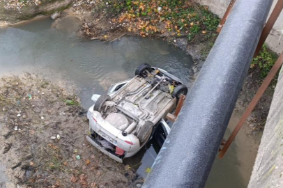 BURSA'DA DEREYE UÇAN OTOMOBİLİN SÜRÜCÜSÜ YARALANDI