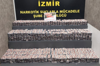 İZMİR'DE BİNLERCE HAP VE KİLOLARCA KOKAİN ELE GEÇİRİLDİ