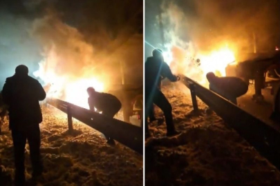 TIR'DA ÇIKAN YANGINI SÖNDÜRMEK İÇİN ELLERİYLE KAR ATTILAR