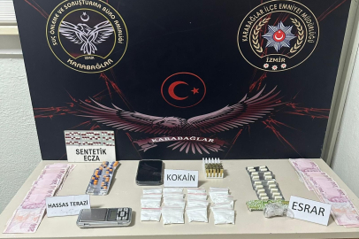 İZMİR'DE UYUŞTURUCU SATAN SEVGİLİLER YAKALANDI