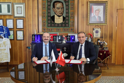 ÜNİVERSİTE PERSONELİNE TARİHİ PROMOSYON ANLAŞMASI