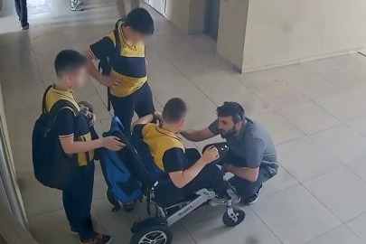BURSA'DA ENGELLİ ÖĞRENCİSİNİ SIRTINDA TAŞIDI