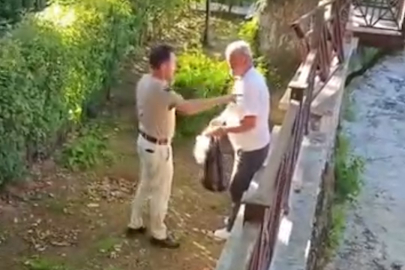 TÜRBE BAHÇESİNDE İÇKİ İÇEN ŞAHSA TEPKİ YAĞDI
