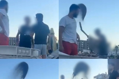 BAHÇE KÜREĞİYLE KUM FIRLATARAK İNSANLARI PLAJDAN KOVDU