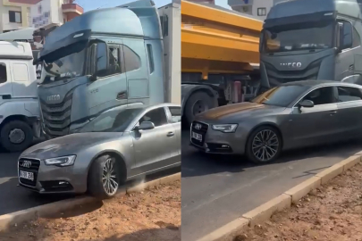 TIR SÜRÜCÜSÜ, CAMI KIRILINCA ARACIN ÜZERİNDEN GEÇTİ