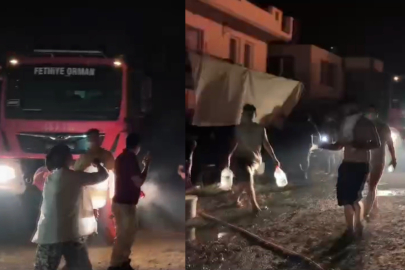 FETHİYELİLER ALEVLERİ SÖNDÜRMEK İÇİN KOVALARLA SU TAŞIDI