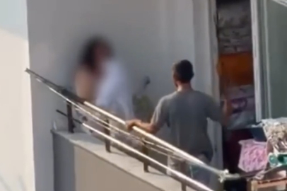 KOMŞULAR TANIK OLDU: KADIN HAVLU İLE KORUNMAYA ÇALIŞTI